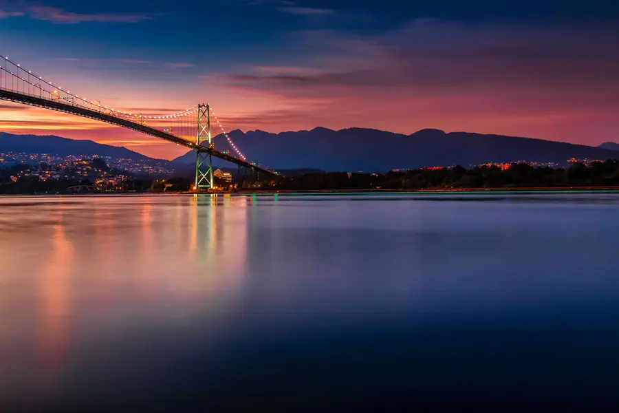 Lions Gate Bridge and the North Shore mountains at dusk, Vancouver